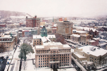 Load image into Gallery viewer, City of Binghamton Winter Scene by Dan Simonds Framed Canvas Print
